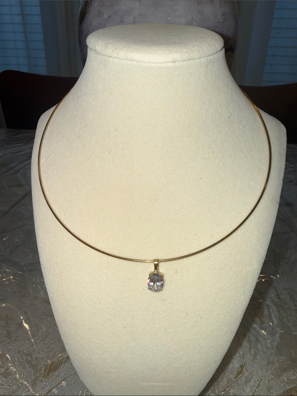 Trendy Gold tone Choker wire necklace with Clear Cubic Zirconia oval Pendant